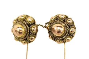 A large pair of antique Dutch gold buttons