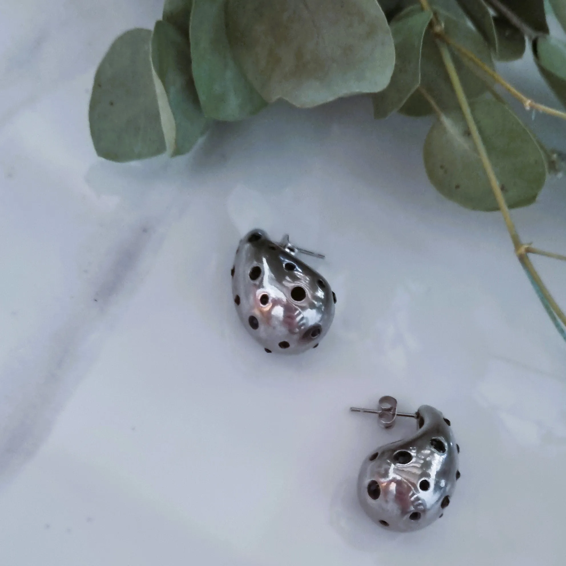 Black on silver drop earrings