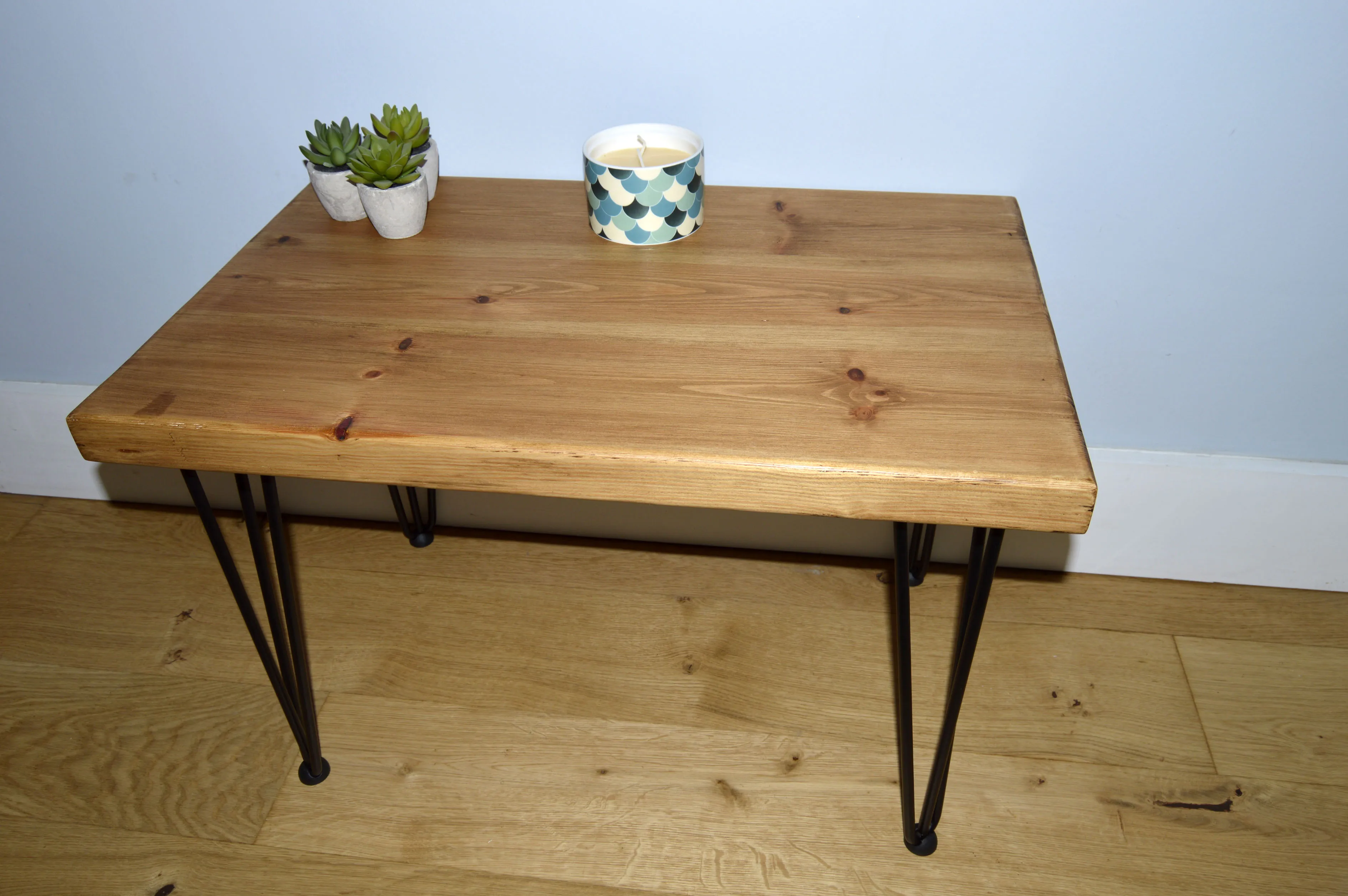 Chunky Redwood coffee table with Black hairpin steel legs