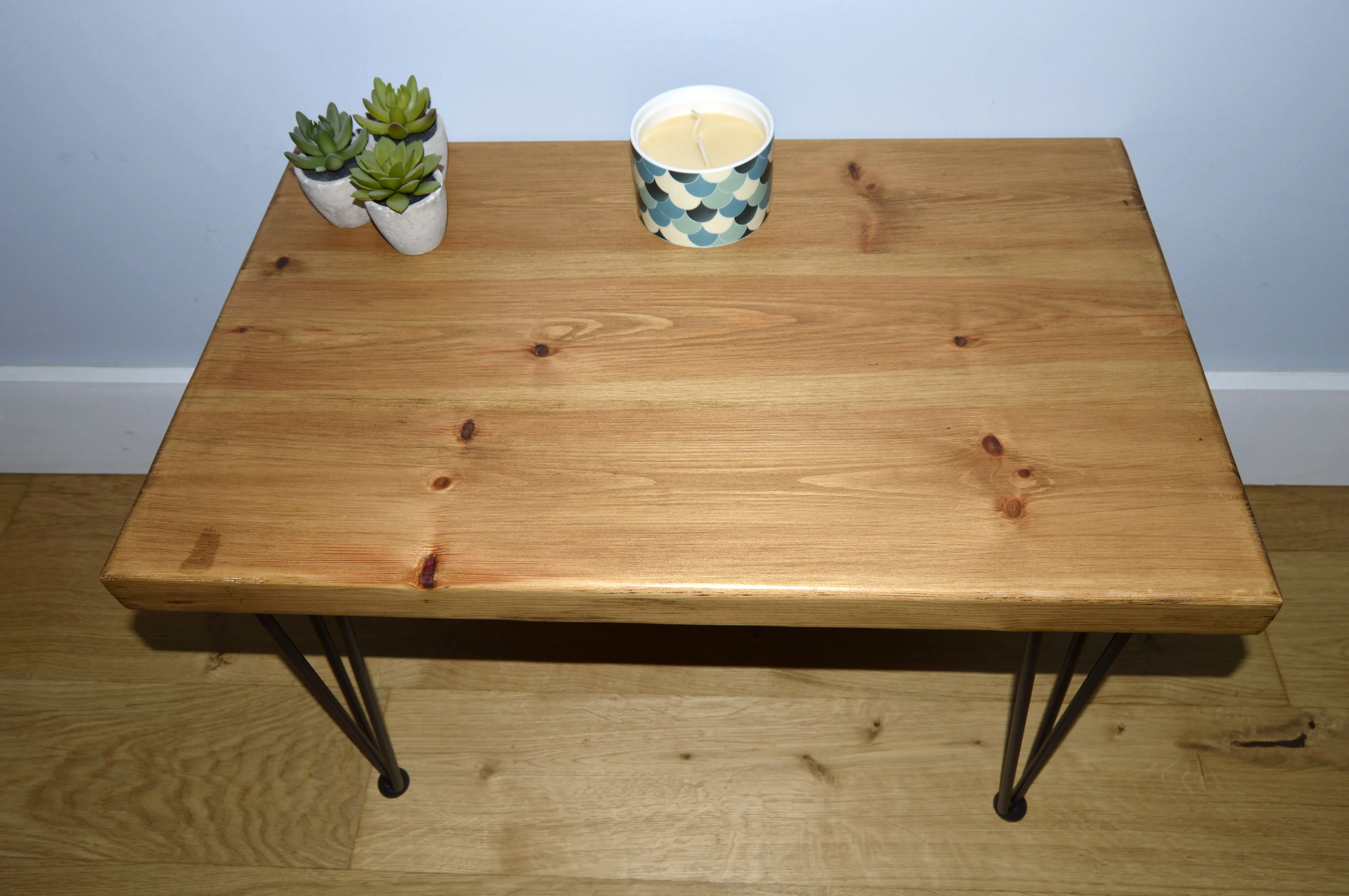 Chunky Redwood coffee table with Black hairpin steel legs